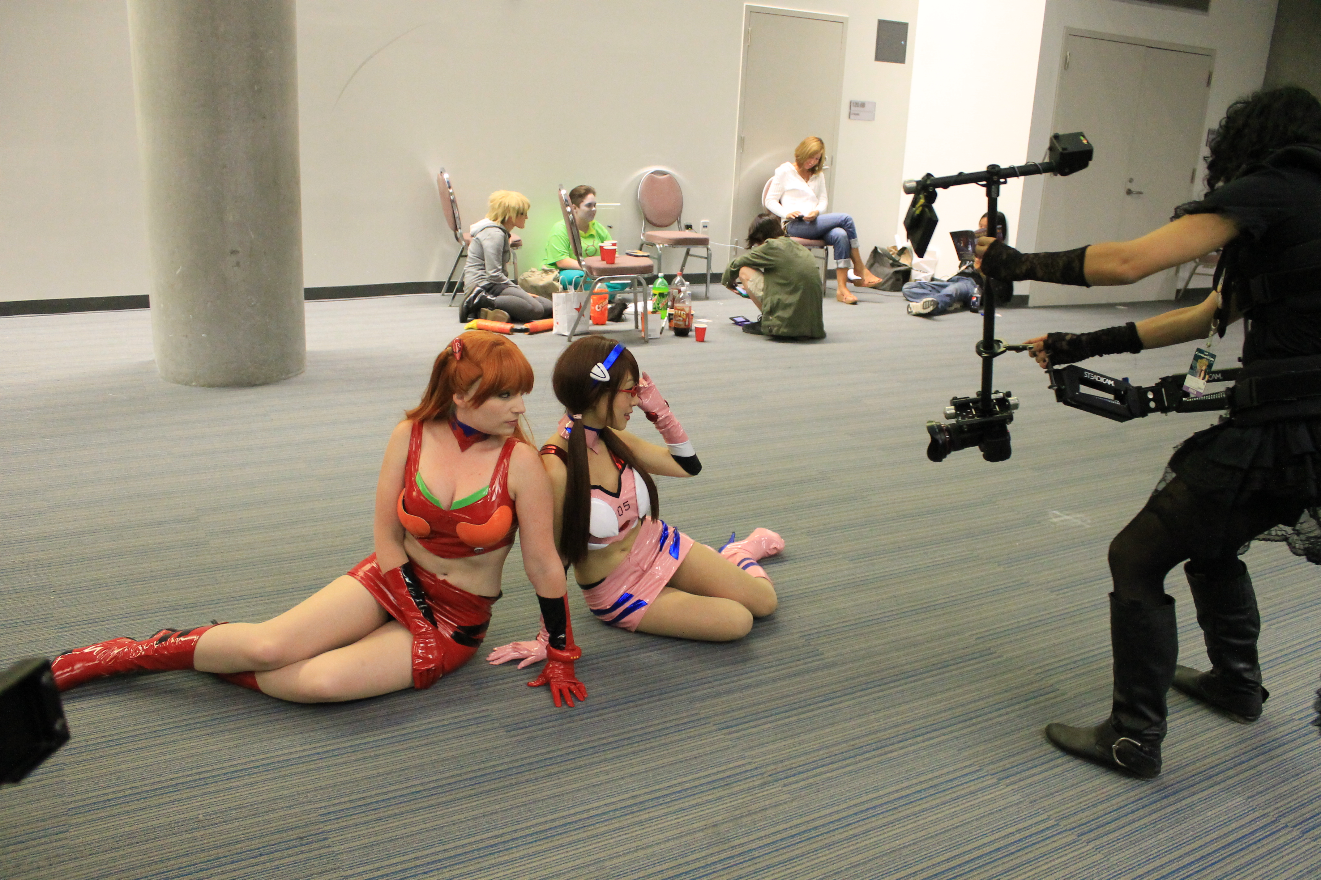 Asuka Langley Sohryu and Mari Makinami Illustrious (Neon Genesis: Evangelion) cosplayers pose for a photograph. Photo from <a href="http://paulmullins.wordpress.com/tag/wplongform/page/3/">Paul Mullins</a>