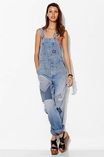 Repaired denim overalls from the Urban Renewal line (image Urban Outfitters).