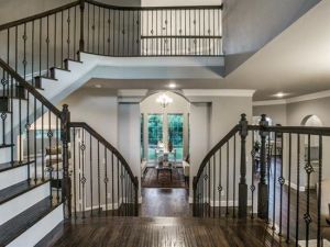 Trat mansions typically feature massive entry foyers like this home in Cedar Hill Texas (image from Zillow)