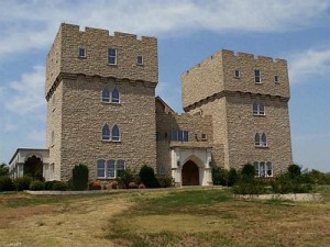 This Texas mansion somewhat cheekily embraces the notion of a "starter castle" (image from Zillow).